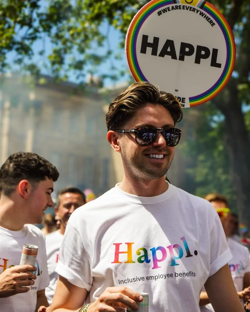 Simon Crowther marching with Happl at Pride in London