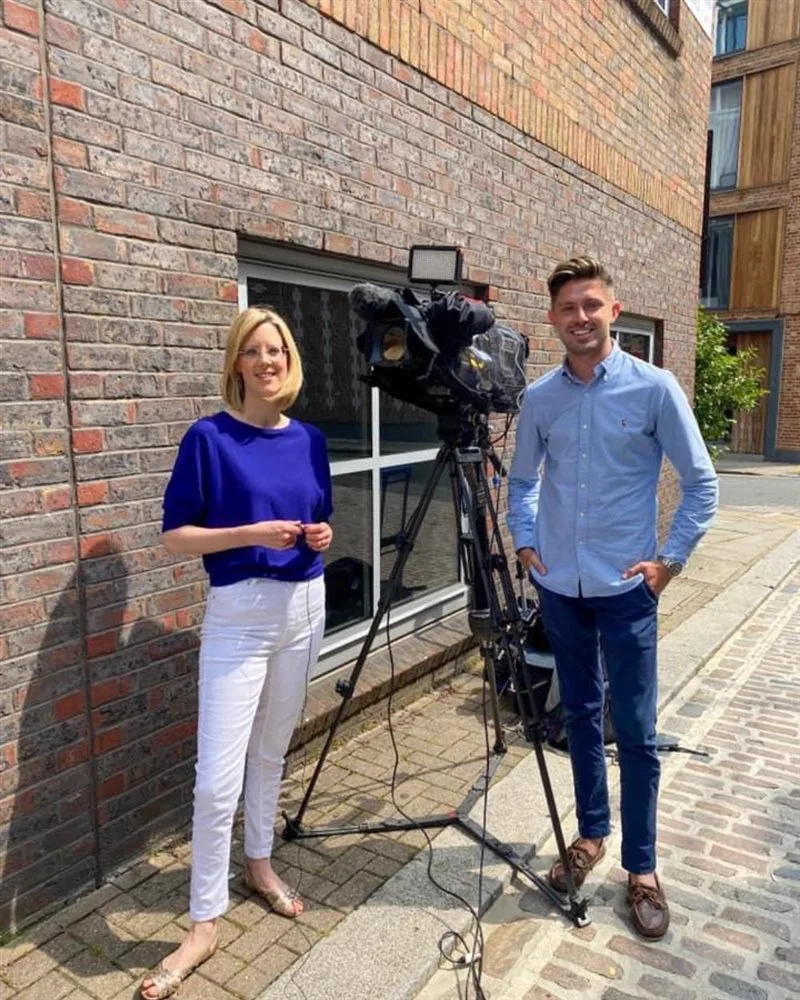 Simon Crowther filming with an ITV weather presenter